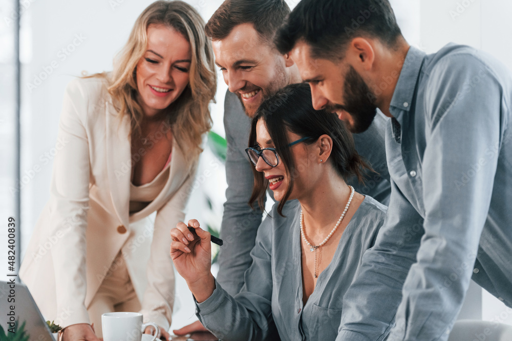 Talking with each other. Group of business people that working on the project in the office