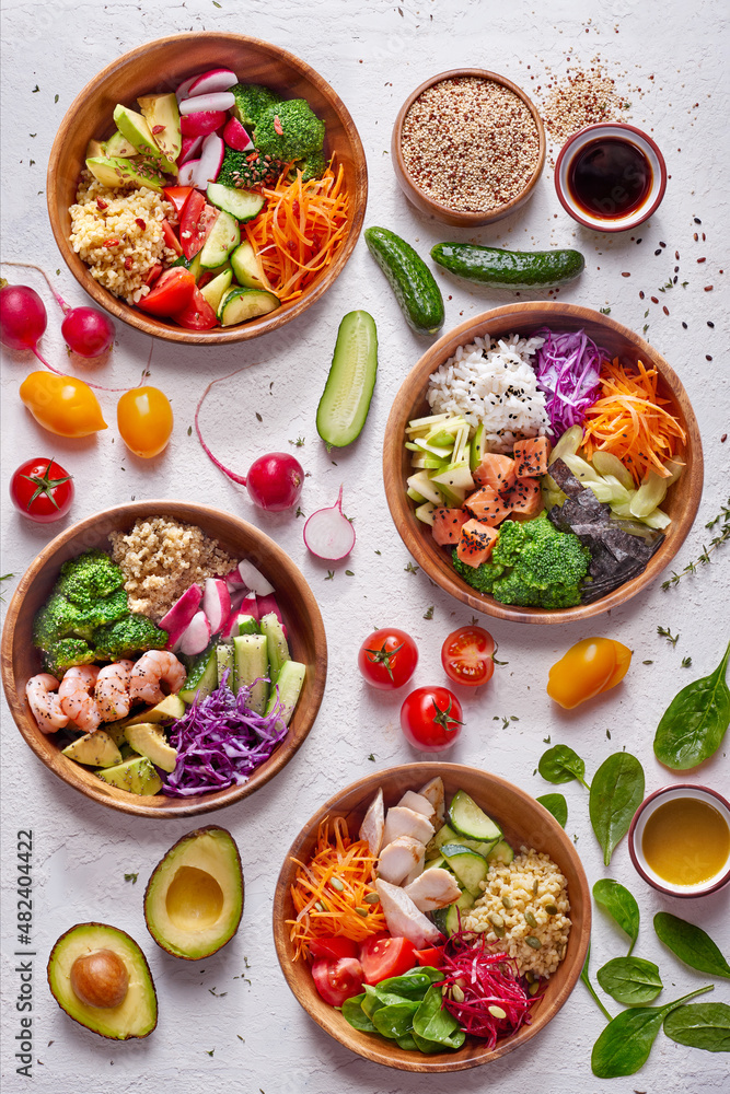 Bowls on a white background decorated with vegetables Bowls on a white background decorated with vegetables