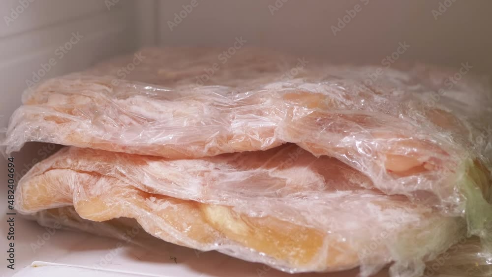Storing and Freezing Fresh Meat Wrapped in Cling Film in the Freezer. Freezer space organization