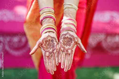 Photography Beautiful Mehndi design on hand young bride's hands with henna Hands with tradit
