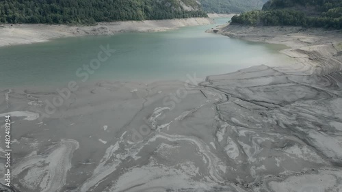 Wallpaper Mural Aerial view forwarding shot over the receding water levels of lake Ayous during autumn season with heavy siltation visible on both sides in the Pyrenees in France Torontodigital.ca