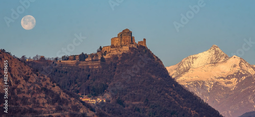 Quadro em tela The Sacra di San Michele (Saint Michael Abbey) , the symbol of the Italian region of Piedmont, In the background the mountains of the Val di Susa with full moon