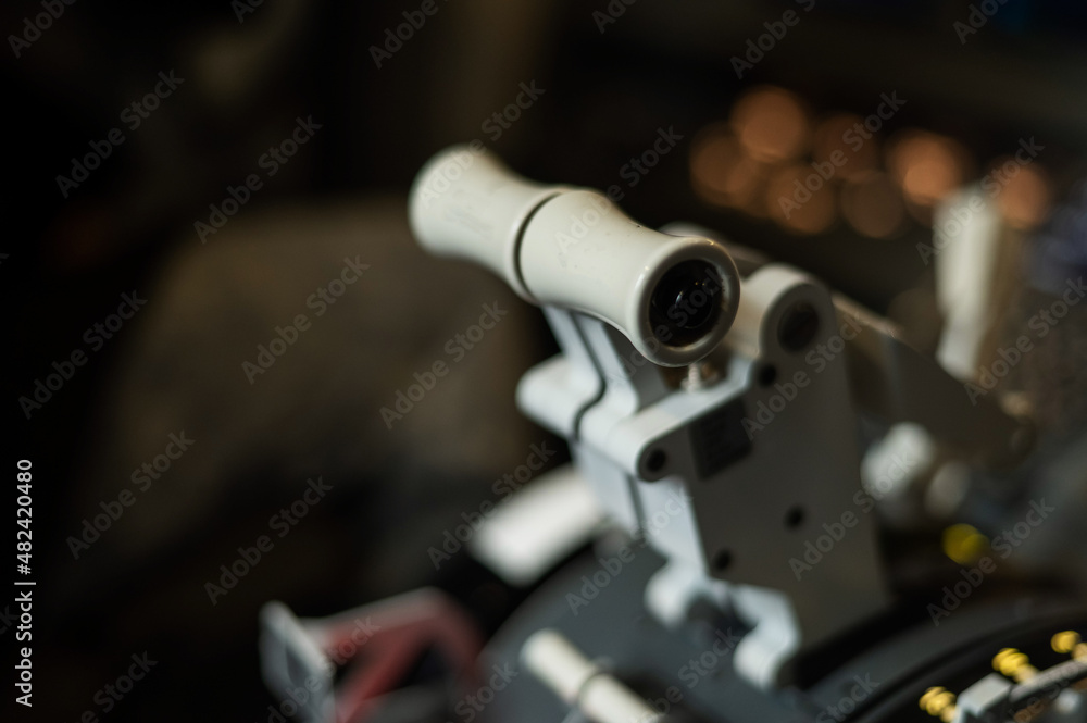 Close-up of an airplane engine control lever. Close-up of an airplane engine control lever.