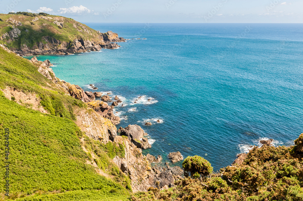 The rugged coastline of Guernsey in the Channel Islands