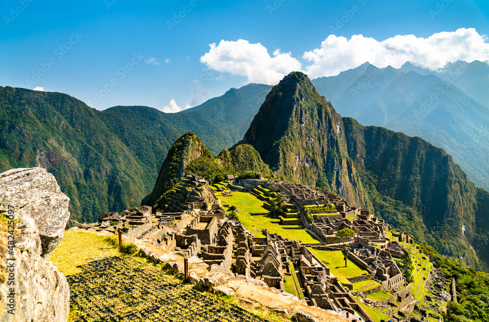 Ruins of ancient Incan city of Machu Picchu. UNESCO world heritage in Peru - obrazy, fototapety, plakaty 