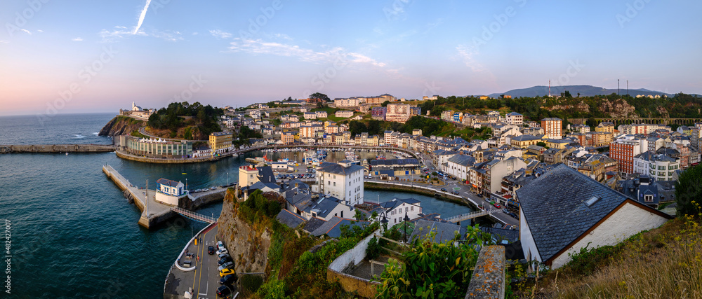 Luarca, Asturias Spain, Europe. Landscape with fishing and pleasure port with boats, harbor, sea and beach. Touristic destination, panoramic sunset