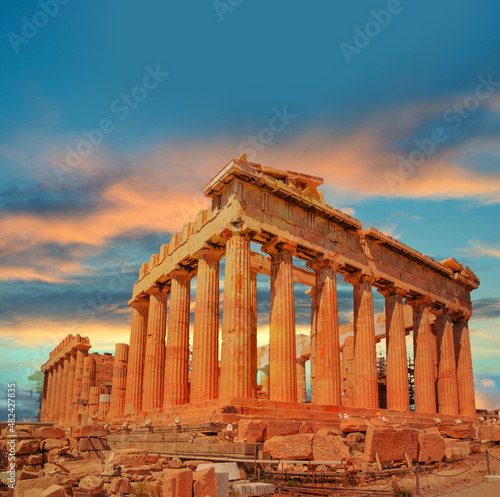 parthenon in athens green sunset clouds colors photo