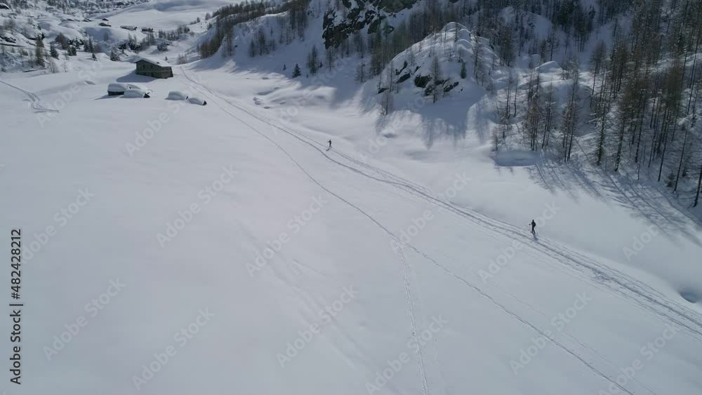 Aerial 4K, excursion with ski mountaineering in Valmalenco in the area of Campagneda, Italy Aerial 4K, excursion with ski mountaineering in Valmalenco in the area of Campagneda, Italy