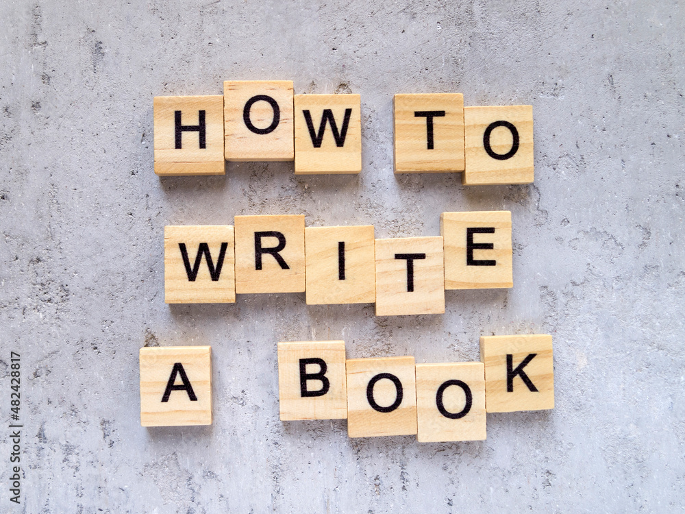 Top view of words HOW TO WRITE A BOOK made from wooden letters. The concept of writing skills. Top view of words HOW TO WRITE A BOOK made from wooden letters. The concept of writing skills.