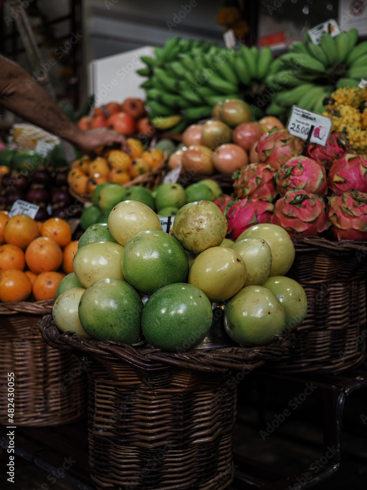 Farmers' markets full of colorful tropical fruits, vegetables and spices in Funchal on the island of Madeira, Mercado dos Lavradores
