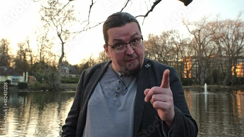 [4k] pissed middle aged man telling off at park