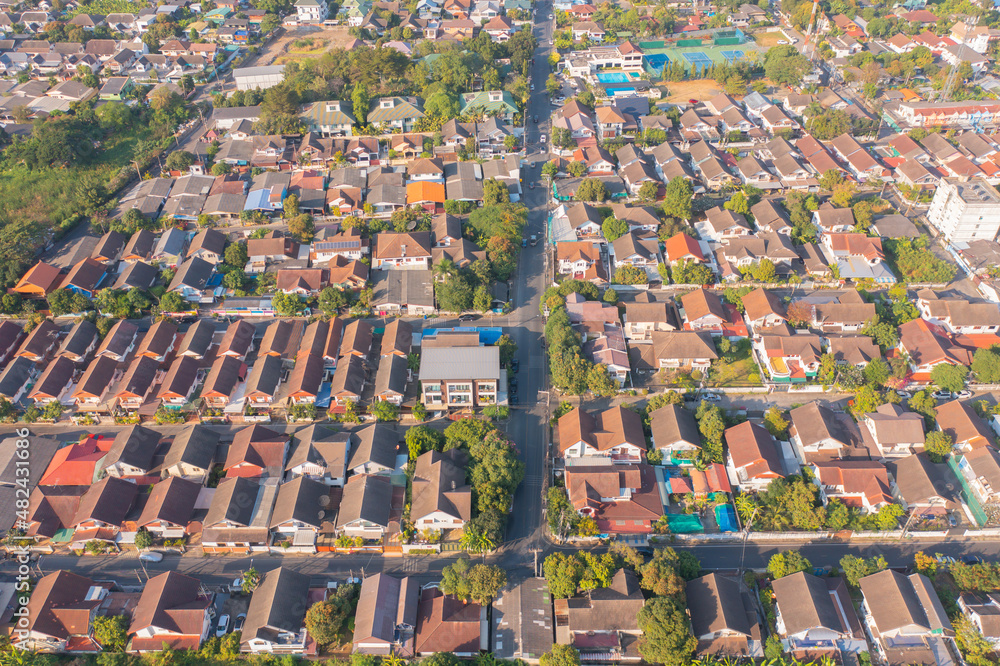 Aerial view of residential neighborhood. Urban housing development from above. Top view. Real estate in urban city town. Property real estate.