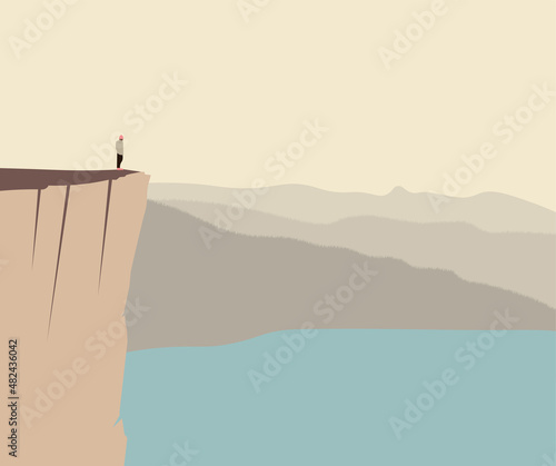 Man on edge cliff