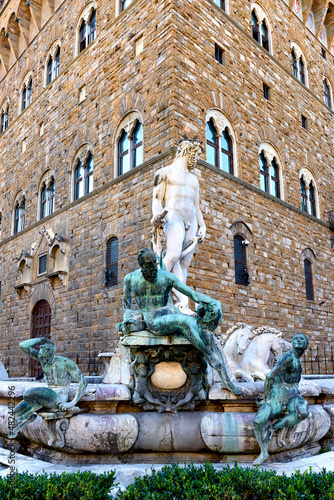 Fountain Neptune in Piazza della Signoria in Florence, Italy. Architecture and landmark of Florence. Postcard of Florence