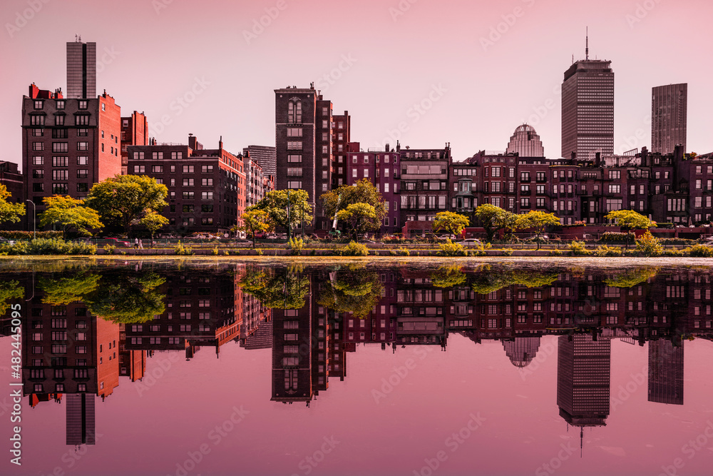 Boston Back Bay Red Brick Buildings and Water Reflections on the Storrow Lagoon at Sunset