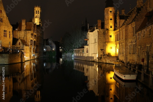 Bruges, Belgium, at night along the canals in winter.