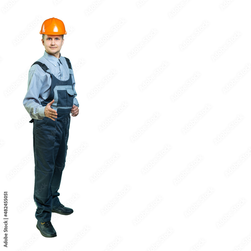 Worker, engineer holds out his hand for a handshake. the man smiles and wants to shake the deal with a handshake. isolated Worker, engineer holds out his hand for a handshake. the man smiles and wants to shake the deal with a handshake. isolated