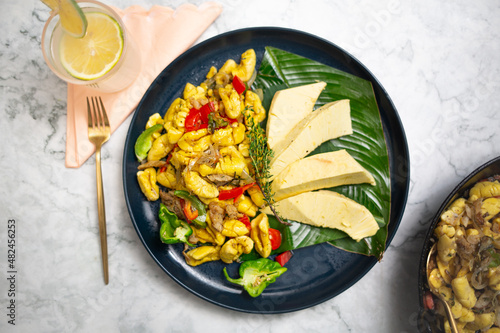 Ackee and Saltfish with Breadfruit in Plate