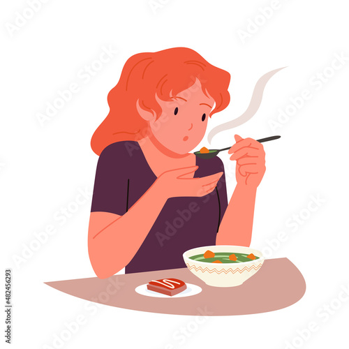 Hungry girl eating hot soup with spoon vector illustration. Cartoon person sitting at table with soup bowl and sandwich to eat dinner or lunch healthy meal in home kitchen or cafe isolated on white
