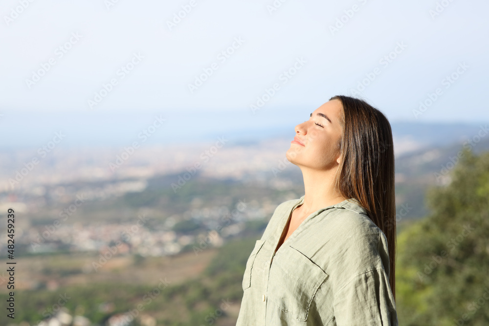 Teen is breathing fresh air in city outskirts Teen is breathing fresh air in city outskirts