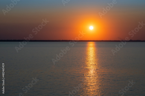 Beautiful red and orang sunset over the lake