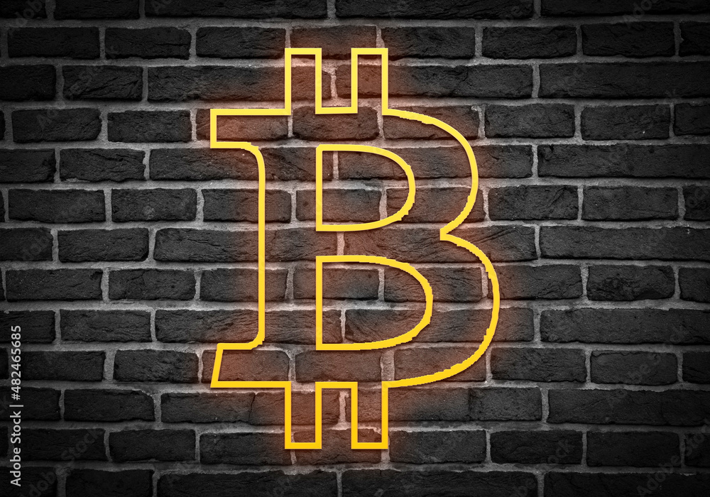 Obraz premium Icono de bitcoin en neón naranja sobre ladrillo negro. 