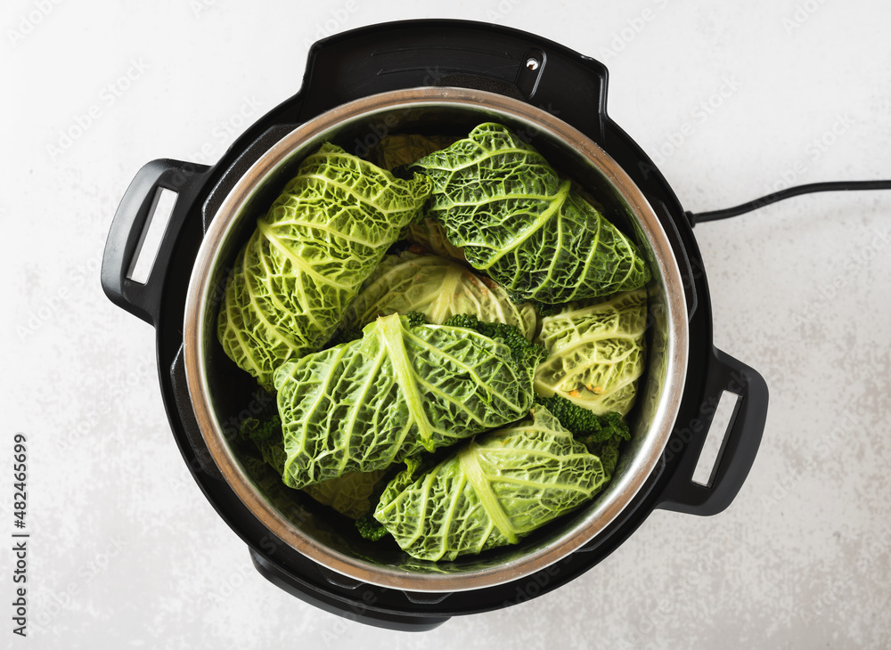 savoy cabbage rolls in instant pot pressure cooker Stock Photo Adobe Stock