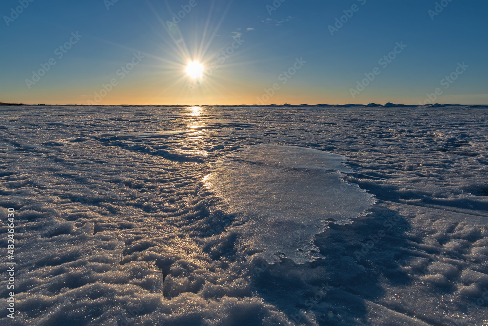 Winter evening on Lake Peipus, Pskov region, Russia