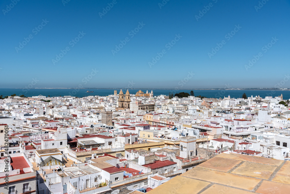 Fototapeta premium Panoramic view of the old city rooftops from tower Tavira in Cadiz, Andalusia, Spain