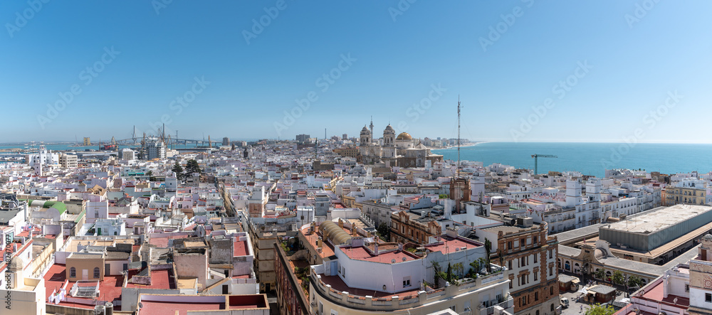 Panoramic view of the old city rooftops and Cathedral de la Santa Cruz from tower Tavira in Cadiz, Andalusia, Spain