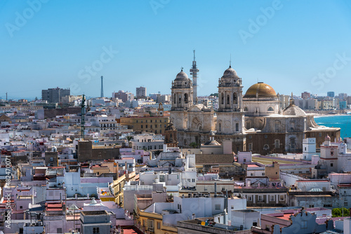 View of the old city rooftops and Cathedral de la Santa Cruz from tower Tavira in Cadiz, Andalusia, Spain