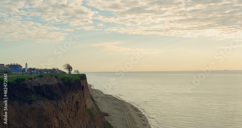 Sunset sea beach cliff horizon in beautiful nature calmness. Peaceful concept.