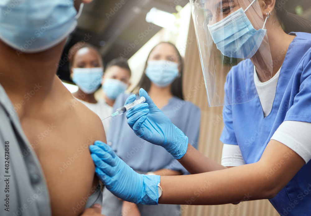 Time for the jab. Cropped shot of an unrecognizable businessman getting his covid vaccination from a female nurse in the office. - obrazy, fototapety, plakaty 