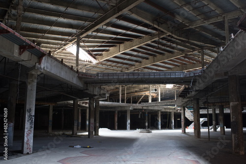 Abandoned shopping mall. Dark urban environment. Large scary place. destruction
