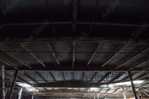 exposed roof ceiling in an abandoned shopping mall