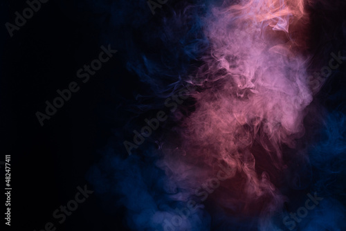 Blue and pink steam on a black background.