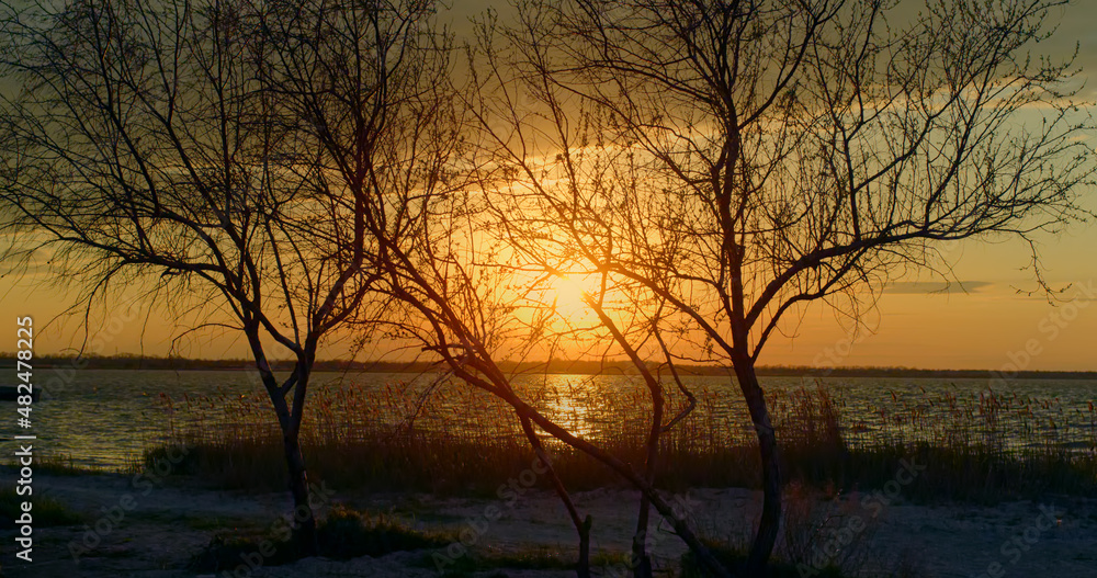 Sunset water horizon shining on yellow sky in sea nature landscape background. Sunset water horizon shining on yellow sky in sea nature landscape background.