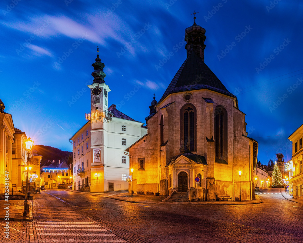 Night street with gothic church