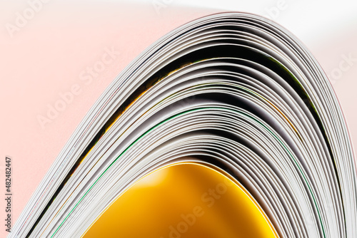 Macro view, edges of opened book as abstract curves