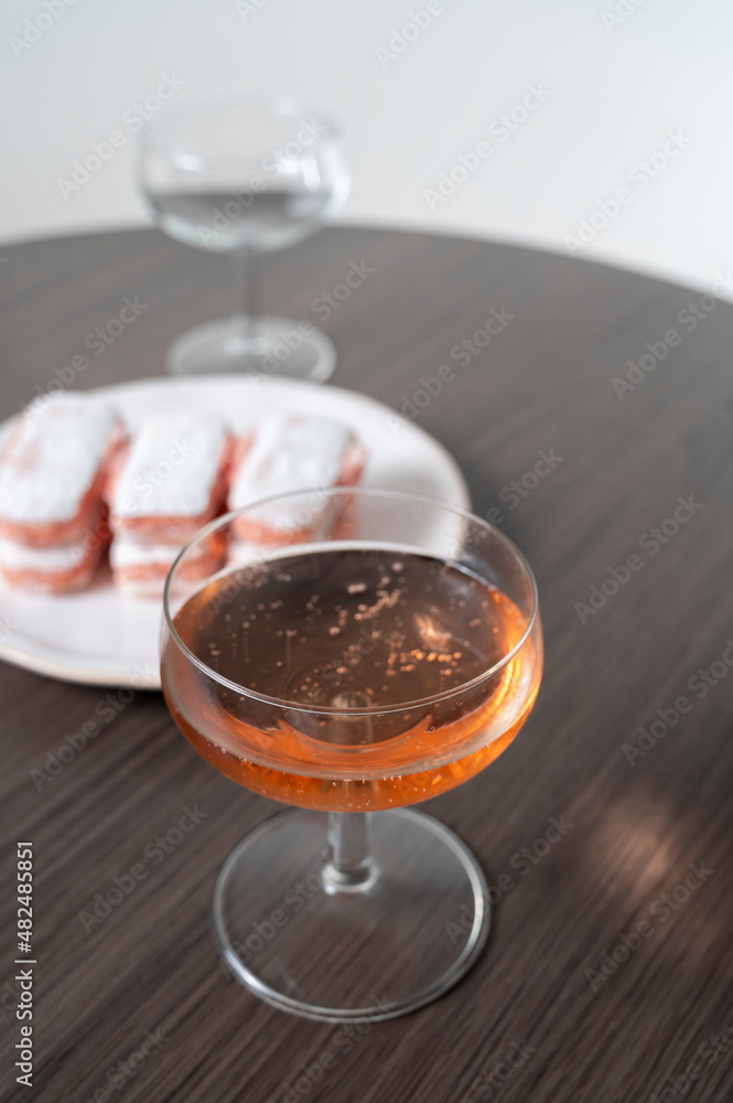 Symbols of Reims - glasses of rose brut champagne and rose biscuits Symbols of Reims - glasses of rose brut champagne and rose biscuits