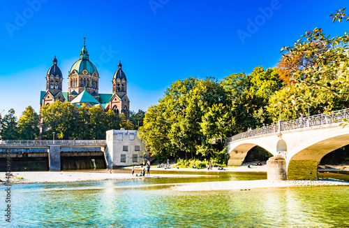 St. Luke's Church Lukaskirche - and isar river in summer landscape of Munich, Bavaria, Germany photo