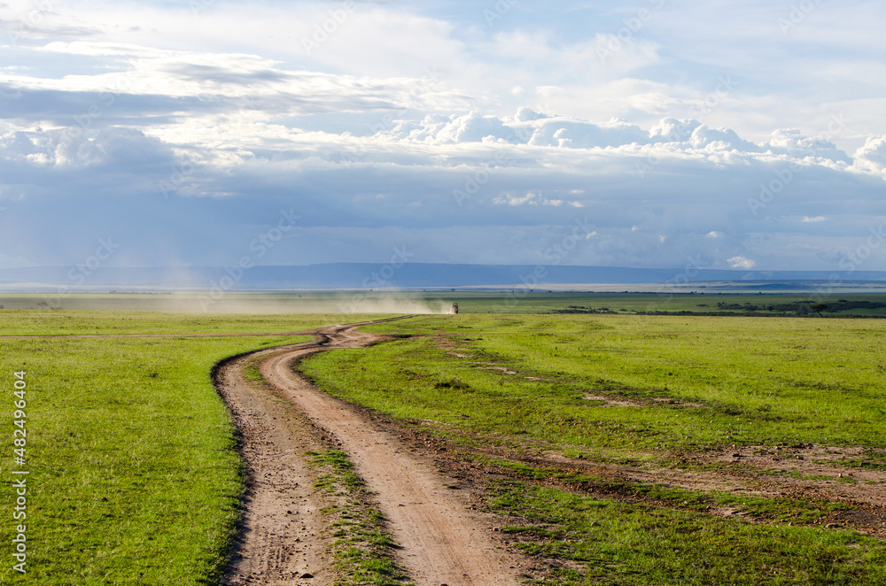 Obraz premium 4x4 off-road car on safari in the savannah, Amboseli, Kenya Africa