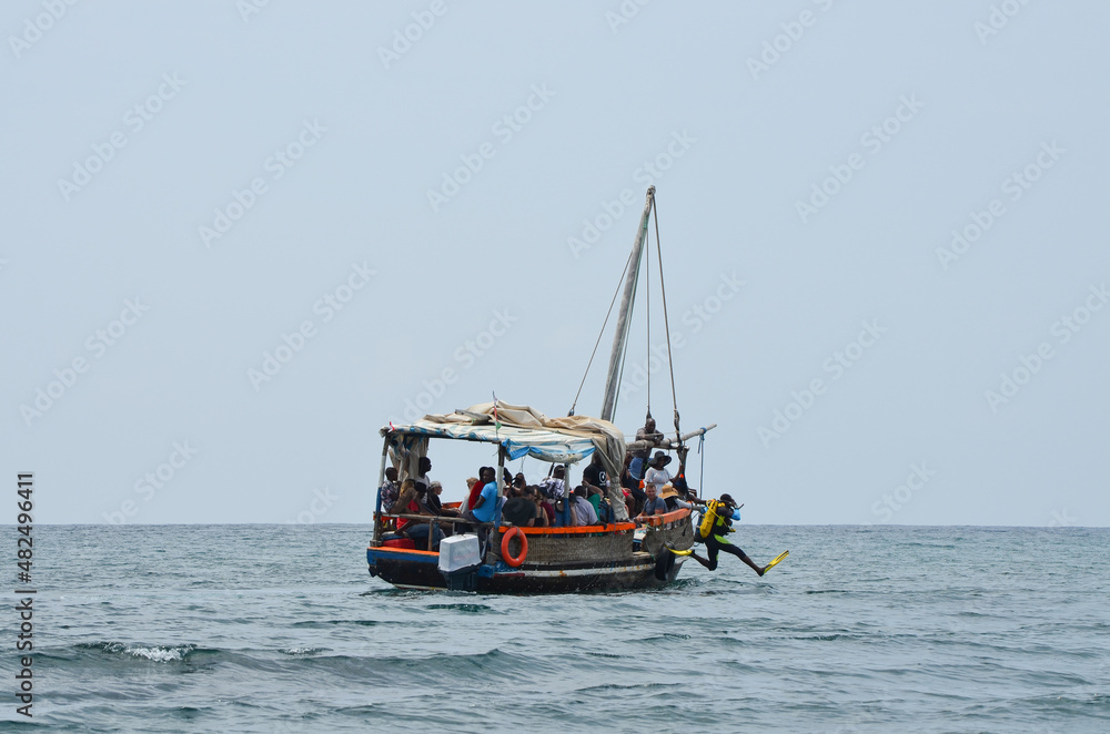 ship with tourists before snorkeling in the indian ocean diani beach
