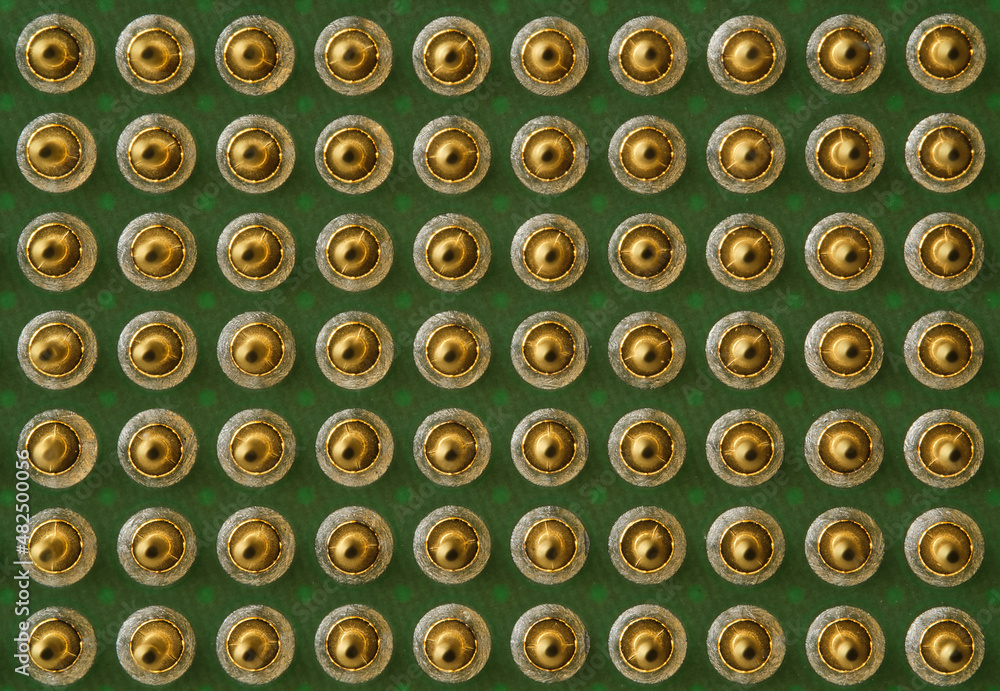 super macro detail of the pins of a computer microprocessor super macro detail of the pins of a computer microprocessor