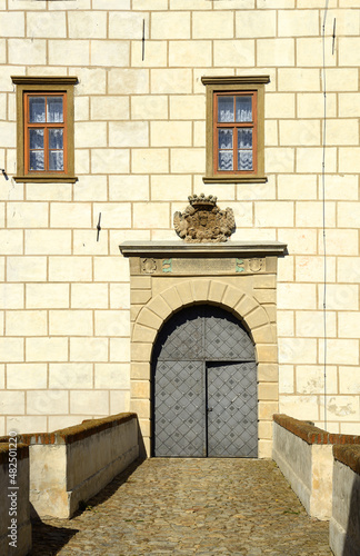 Detail of the facade of the Old Castle Jevisovice, Moravia, Czech republic, Europe. Gothic castle in the rocky meander of the Jevisovka River, rebuilt into a Renaissance and early Baroque chateau. photo