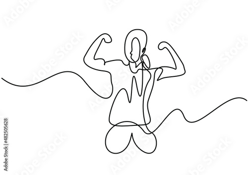 strong and fit woman concept showing her muscles