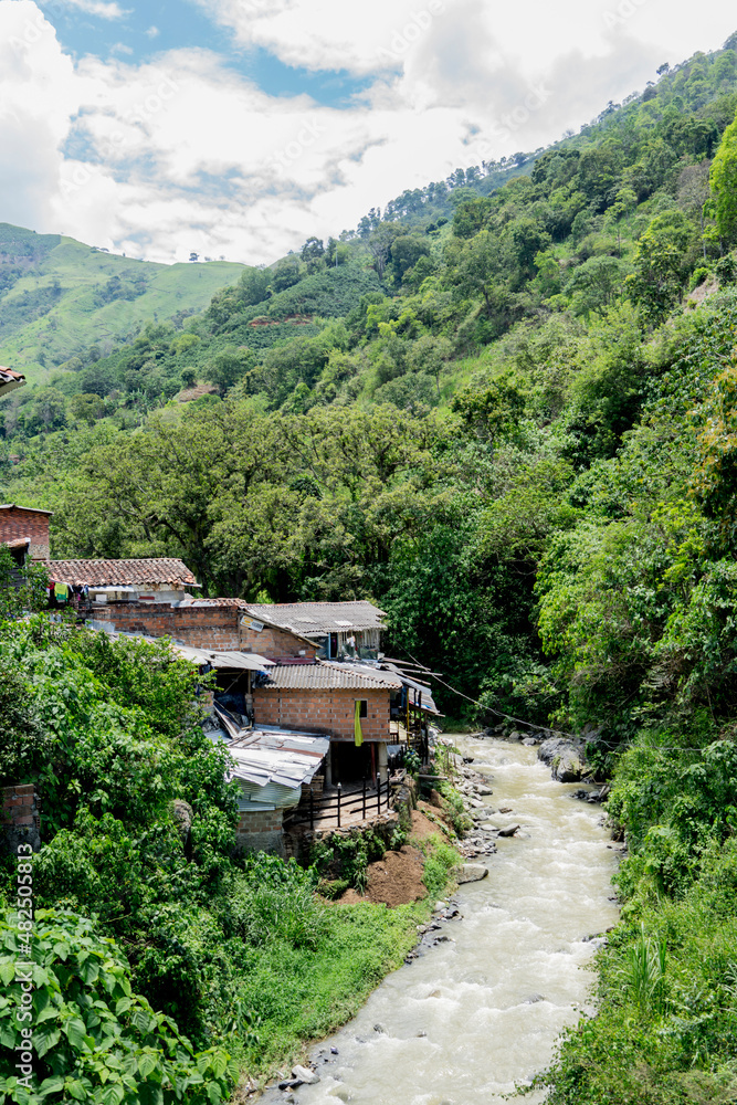 landscape with river of colombian town in mountain landscape with river of colombian town in mountain