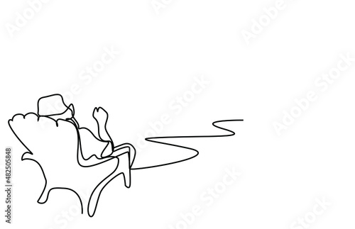 an old man lying on a chaise longue against the sea