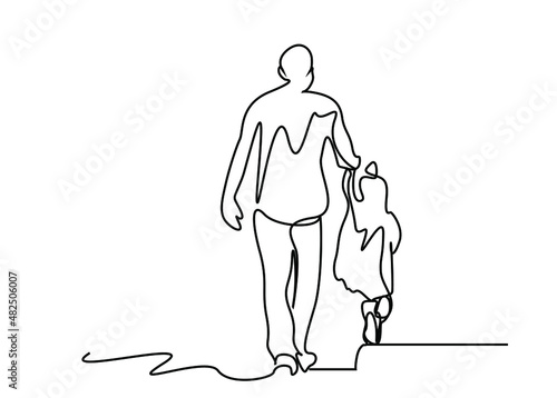 father and little daughter walking happily outside together