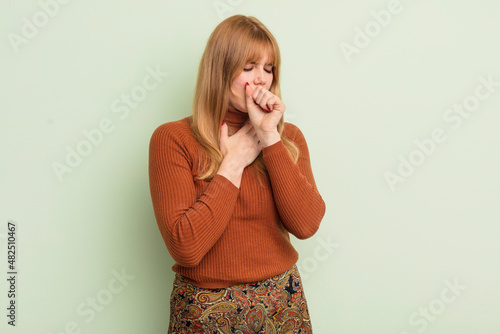 Bild auf Leinwand redhead pretty woman feeling ill with a sore throat and flu symptoms, coughing w